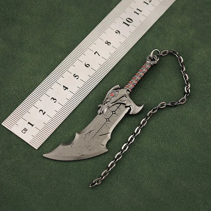 Aprobado por Kratos: Llavero Espadas del Caos – 9 cm de furia pura